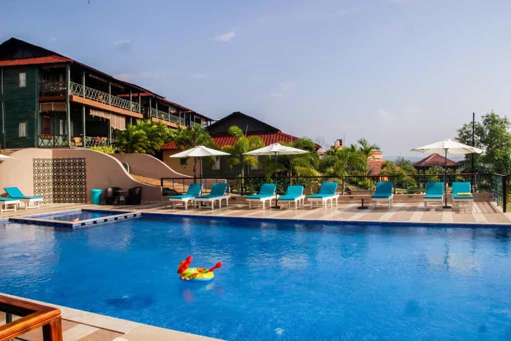 4 Star hotel Swimming pool with Exterior at Oxygen Resorts in Morjim