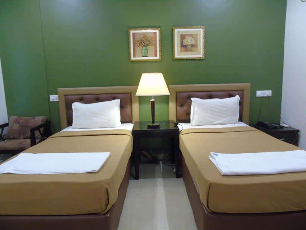 Twin bed at Seasons Hotel & Spa