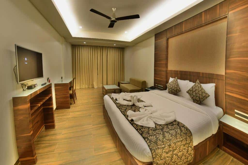 Bedroom with TV at Zone Connect Goa